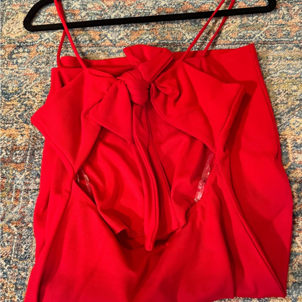 Sexy candy apple red 🍎 bodycon dress with back bow and open back detail.